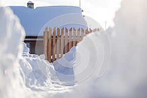 Clearing snow after a big snowfall in winter.