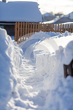 Clearing snow after a big snowfall in winter.