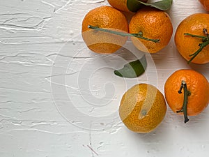 Clementine, a citrus fruit on white background