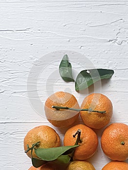 Clementine, a citrus fruit on white background