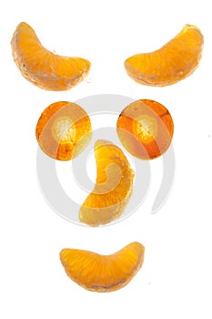 Clementine parts on white background