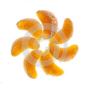 Clementine parts on white background