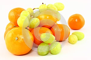 Clementines And Grapes On White
