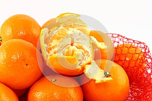 Clementines In A Red Net Close Up
