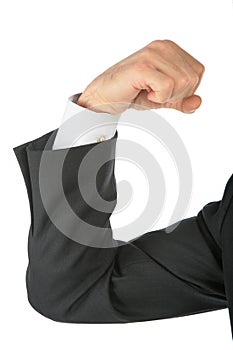 Clenched fist, arm in business suit