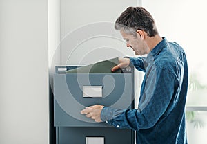 Clerk searching files