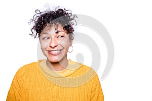 Clever black woman face expression isolated on yellow background