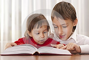 Clever boy learns lessons at home