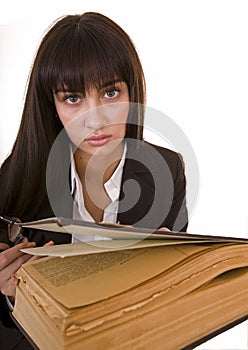 Clever girl with old book.