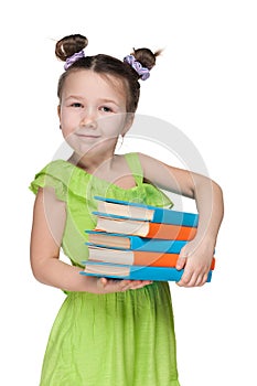 Clever smiling little girl with books