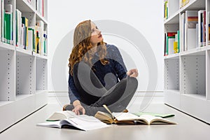 Clever University Student Studying in White Modern Library Books