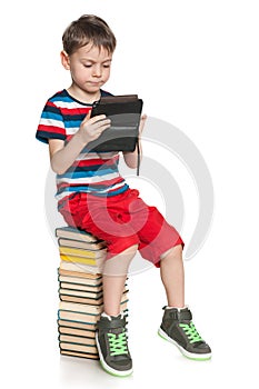 Clever young boy with a gadget