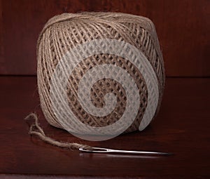 Clew of Twine and Needle