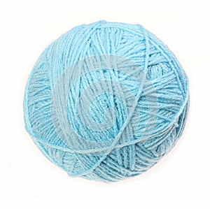 Clew of woolen thread isolated on a white background. Blue ball of woolen