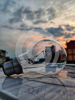 Click of a bulb with evening sky view