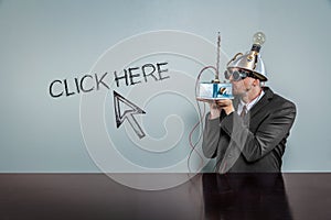 Click here text with vintage businessman