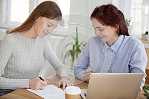 Client and agent signing of a contract in office