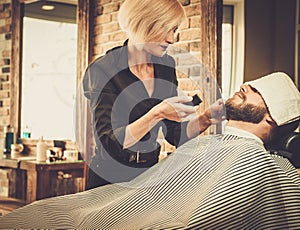 Client during beard and moustache grooming