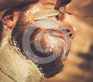 Client during beard shaving