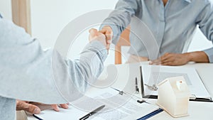 Client customer handshake together for successful deal to buy insurance services make sale purchase deal agreement take bank loan