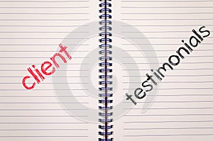 Client testimonials text concept on notebook