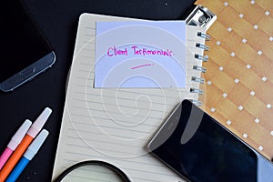 Client testimonials word written on paper. client testimonials text on workbook, technology business concept