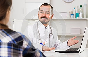 Client visiting consultation with man doctor