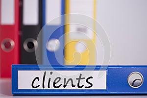 Clients on blue business binder