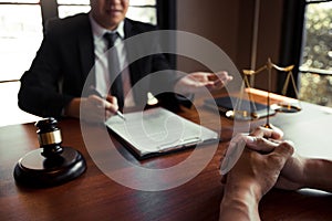 Clients come to seek advice for the law regarding privacy violations with the lawyer at the office