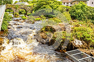 Clifden waterfalls with regular water flow on the Owenglin or Owenglen river