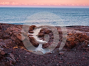 A cliff on the Arctic coast. Minimalist scenery with beautiful r