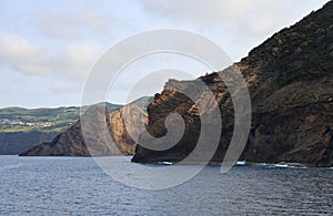 Cliff of the bay of Entre Morros, in the island of Sao Jorge, Azores photo