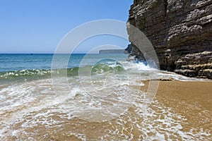 Cliff in the Beliche beach, Sagres, Portugal photo