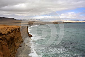 Cliff coast of Atacama desert near Paracas in Peru