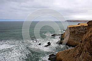 Cliff coast of Atacama desert near Paracas in Peru