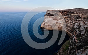 The cliff coast of Lampedusa photo