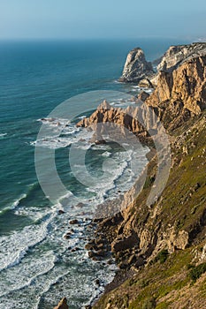 Cliff in the coastline with blue sea