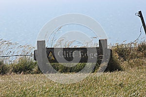 Cliff Edge sign wooden grungy