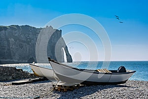 Cliff of Etretat with backlight photo