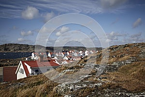 Cliff landscape and a small Swedish by the sea