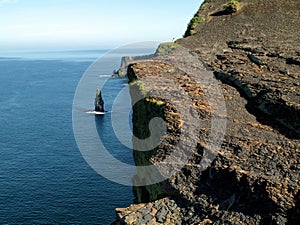 Cliff of Moher, county Clare, Ireland. Rock formation, Atlantic ocean, Sunny warm day. Part of Wild Atlantic Way experience
