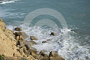 Cliff with ocean and rock formation