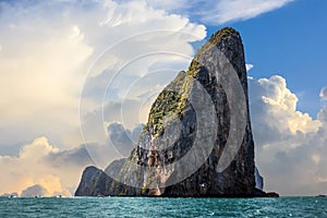 The cliff of Phi Phi leh with big clouds over a blue sky, Phi Phi island, Thailand