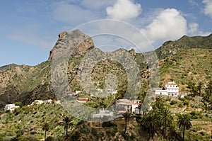 Cliff of Roque Cano and rural landscape.