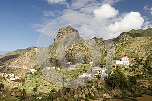 Cliff of Roque Cano and rural landscape.