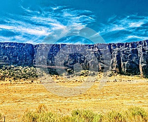 Cliff Side With Clouds