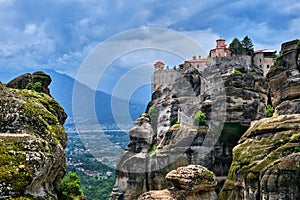 Cliff-top Great Meteoron monastery in rocky landscape of famous Meteora valley, Greece, UNESCO World Heritage