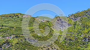 The cliff top village of San Bernardino looks down on the Cinque Terre coastline