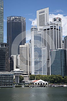 The Clifford Pier with red roof with Singapore CBD as background