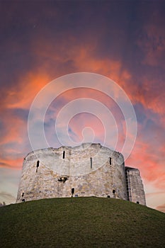 Cliffords Tower in York under a blood red sky